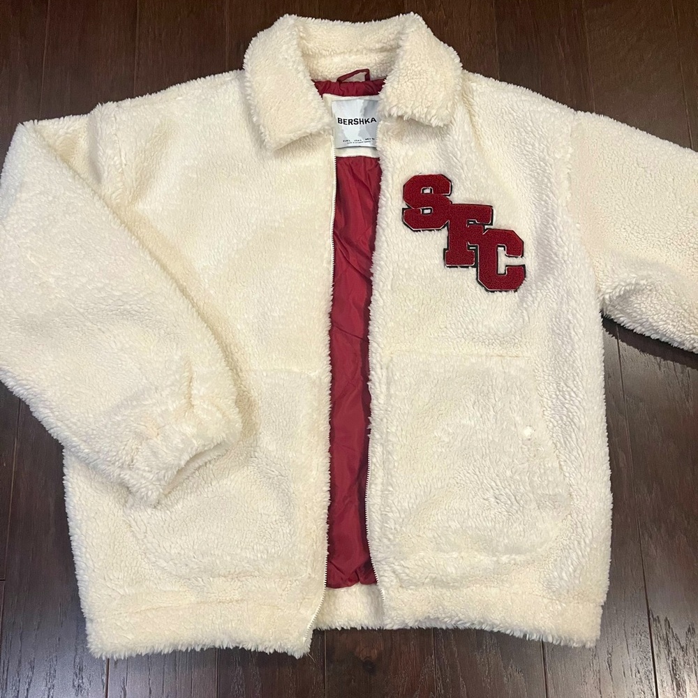 Faux shearling jacket with patches